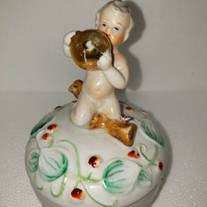 Boy Holding Bell Trinket Box